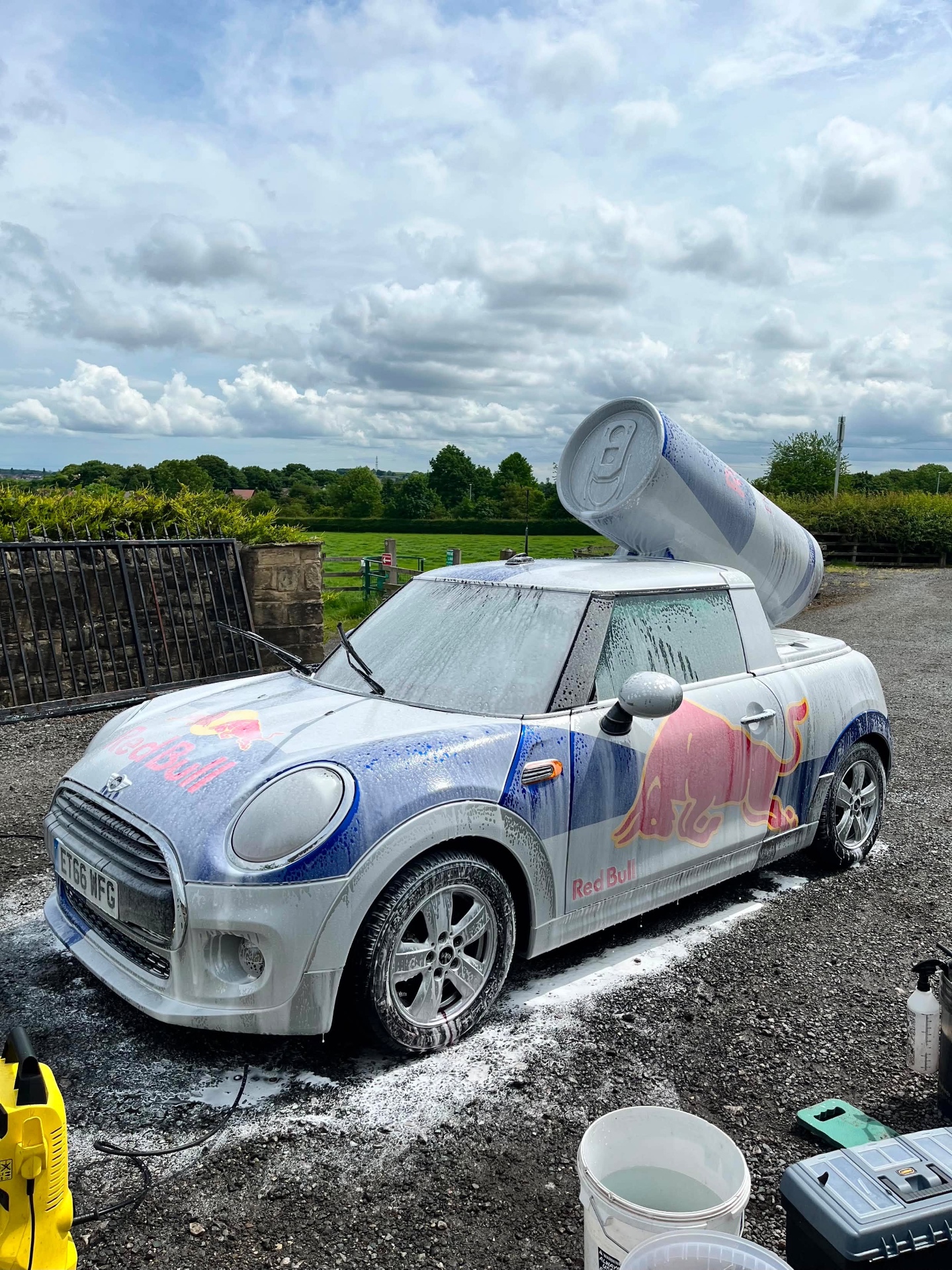 Red Bull-wrapped Mini covered in foam during a Storr Details wash